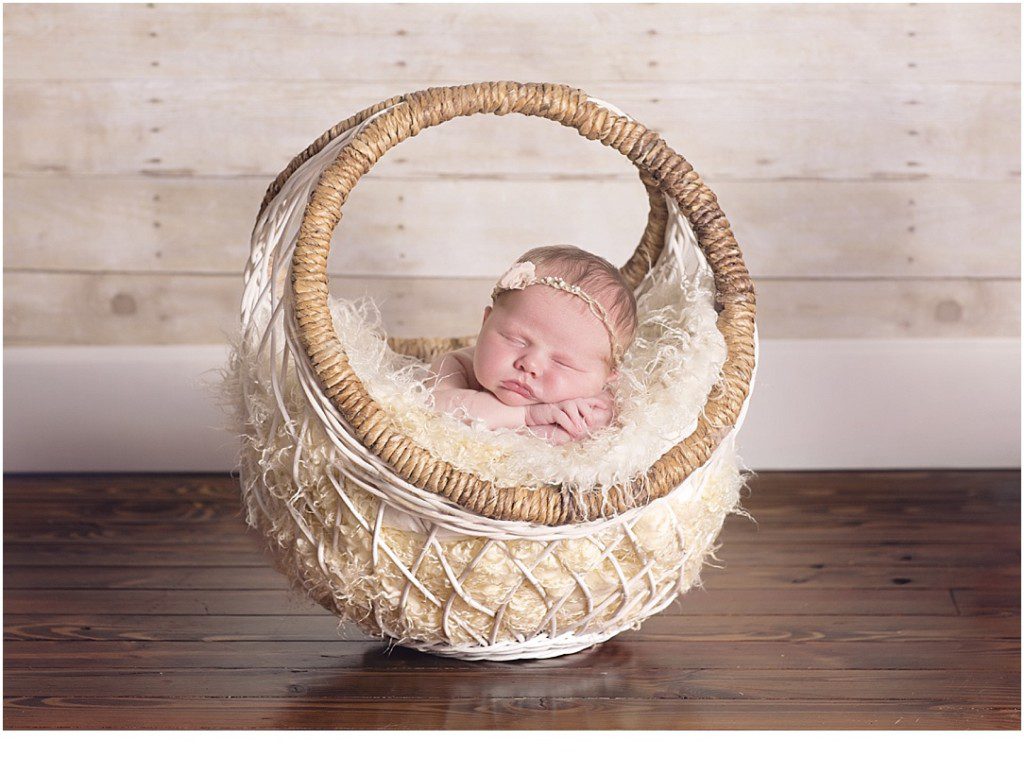 baby in a basket pose